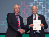 Prof Sir Bruce Keogh, right, receiving Honorary Fellowship of FMLM from Prof Sir Neil Douglas
